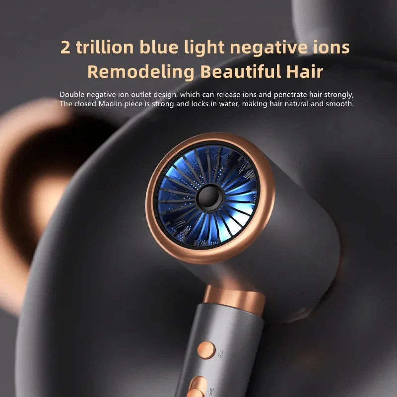 Close-up of a black hair dryer with a blue light feature and a gold accent, showing the nozzle area.