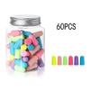 A jar of 60 pairs of colorful memory foam earplugs in various shades of green, pink, and purple.