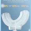 Close-up view of a clear U-shaped brush head design for baby teeth brushing