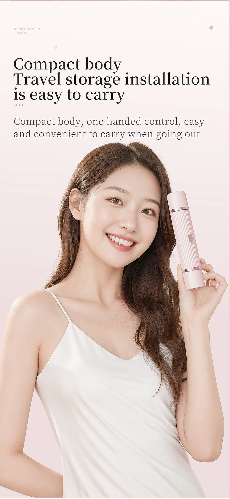A smiling woman holds a pink electric body and hair removal razor while wearing a white top.