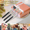 A pink gift box is shown with a set of stainless steel telescopic back scratchers and a travel pouch.