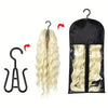 Black storage bag for a blonde wig with a hanger and a zipper visible.