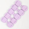 A collection of round, lavender latex-free finger puffs for makeup application.