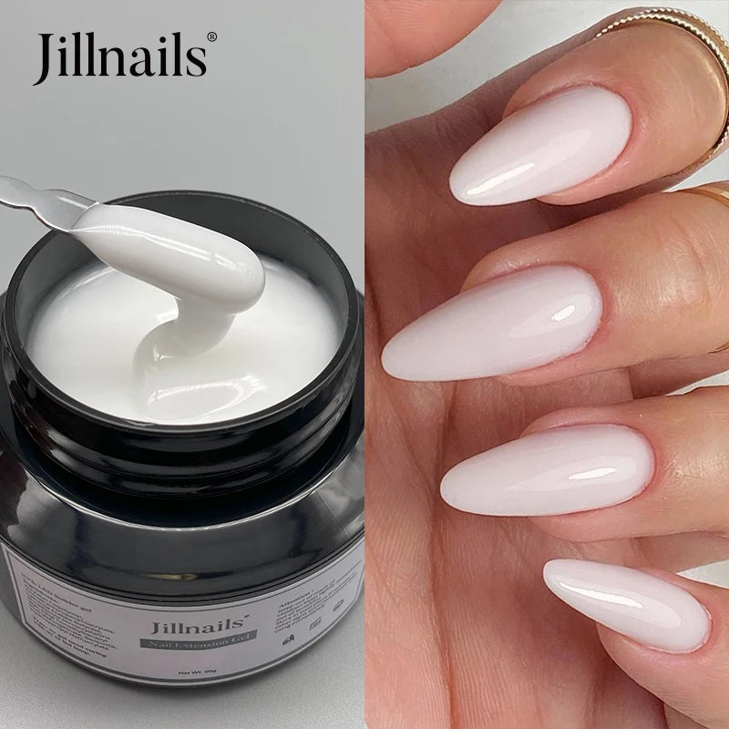 Pot de constructeur de gel pour ongles Jillnails, avec applicateur blanc et ongles manucurés.