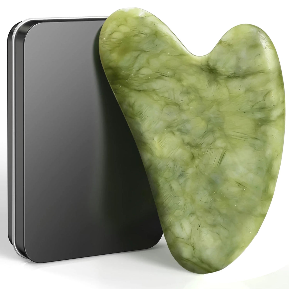 A smooth, light green jade gua sha tool is shown next to its black storage case.