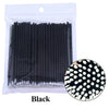 Un pack de pinceaux pour nettoyer et appliquer des cils fins noirs dans un sac en plastique transparent.