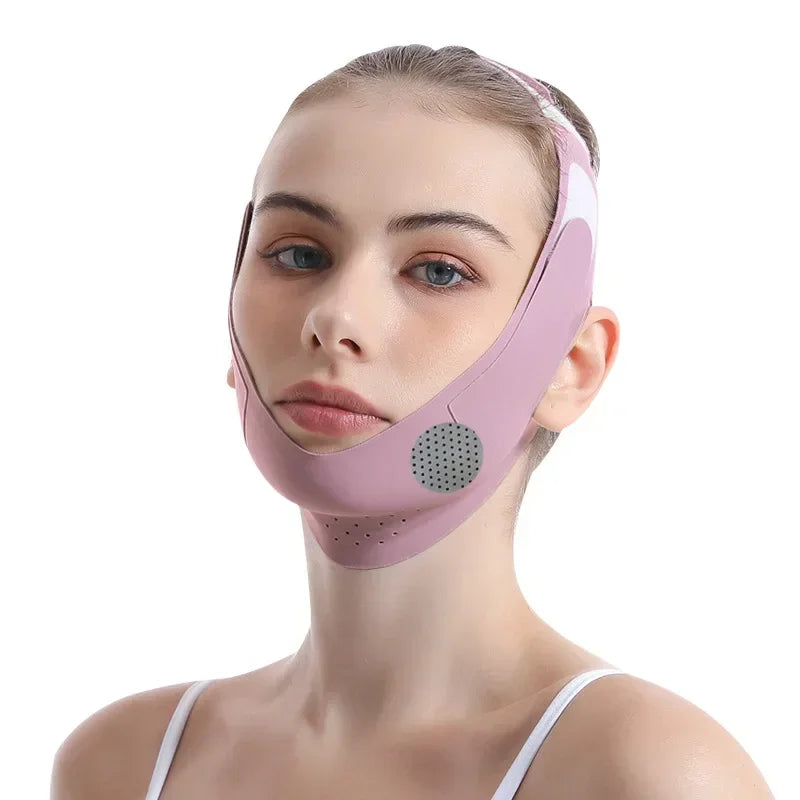 A woman wearing a pink V-Line face slimming lifting bandage on her face.