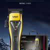 A yellow VGR professional hair clipper model V-015 is shown against a dark, mountainous background.