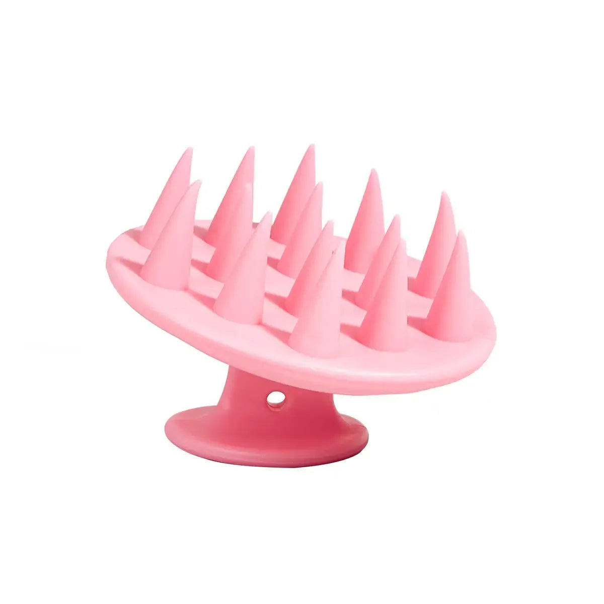Brosse de massage portable en silicone rose avec poils multiples pour le cuir chevelu et les cheveux.