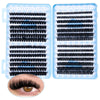 A pair of clear containers holding clusters of black and blue lash extensions, shown next to an eye.