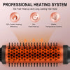 Close-up of an electric hair curling comb heating up, showing orange glow and heat distribution.