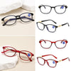 A collection of black, blue, and red progressive multifocal reading glasses displayed on a white background.