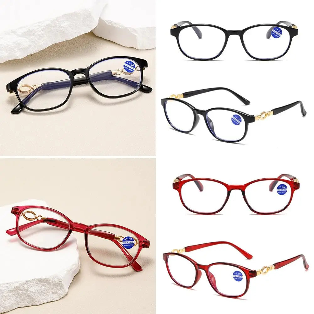 A collection of black, blue, and red progressive multifocal reading glasses displayed on a white background.