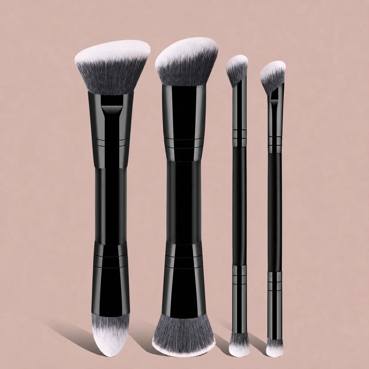 A set of six black and silver dual-ended makeup brushes displayed against a light pink background.