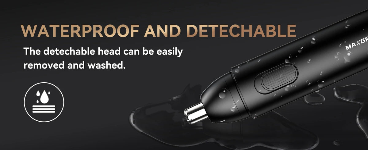 A close-up view of a black precision rechargeable nose hair trimmer being used on a dark surface.
