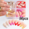 A collection of 96 press-on nails in various pink, nude, and red shades displayed in a clear plastic container.