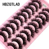 A pink plastic tray holding 10 pairs of black false mink eyelashes.