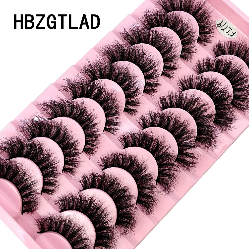 A pink plastic tray holding 10 pairs of black false mink eyelashes.