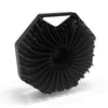 Black silicone exfoliating shower scrub brush with a textured, fan-like head.