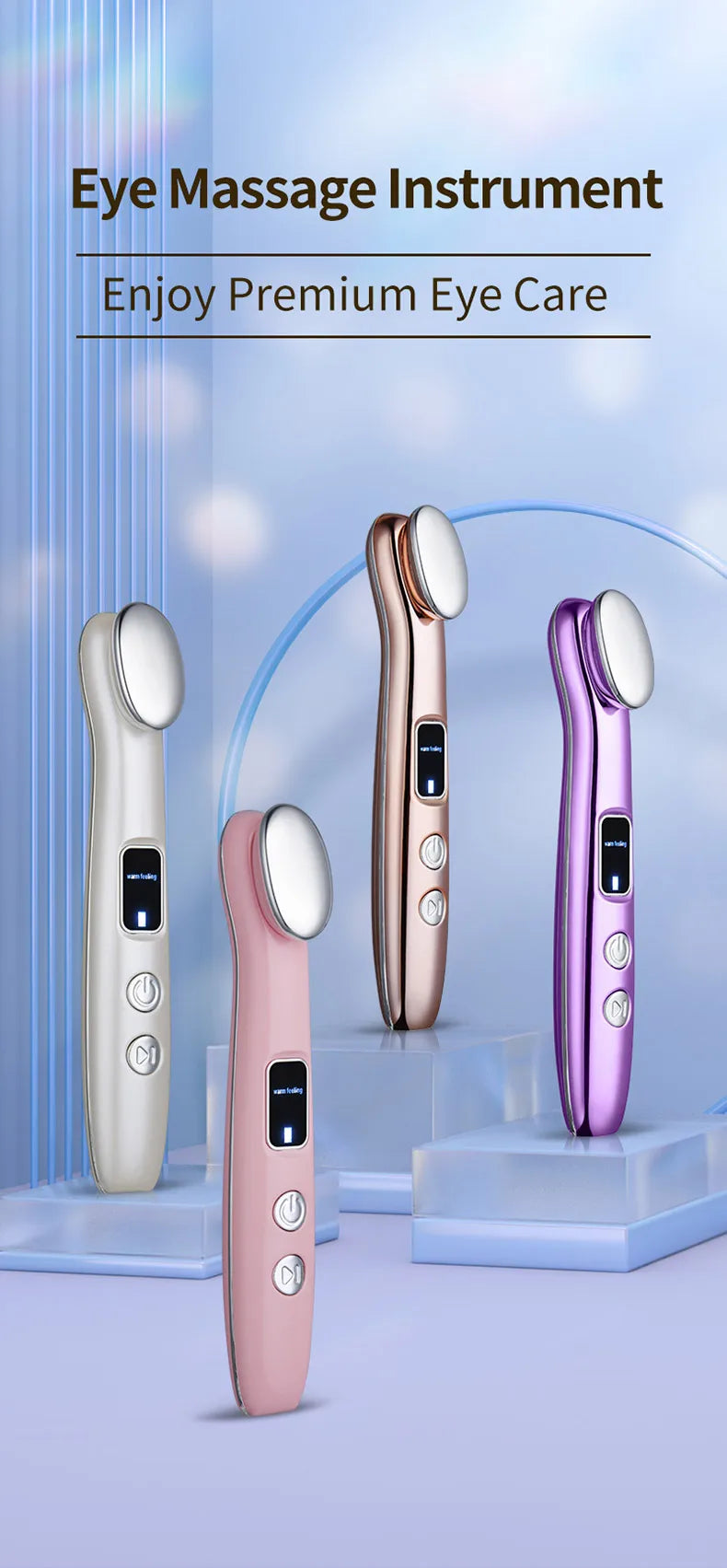 A collection of three rose gold and purple eye massage instruments displayed on a light blue background.
