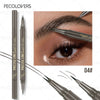 A close-up of a double-ended eyebrow pencil tip applying dark brows to an eye.