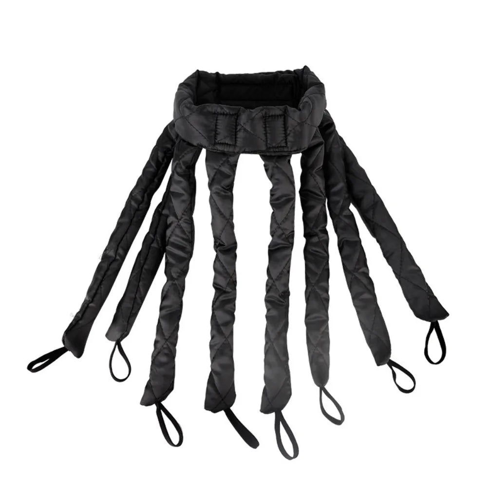 Black removable heatless hair curlers with long, thin strands for overnight styling