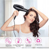A woman is using a black Sokany professional high-power hair dryer to style her dark hair.