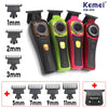 Set of Kemei KM-999 professional cordless hair trimmers with various guard sizes and attachments