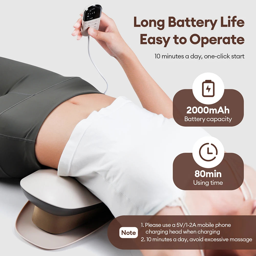A hand is using an electric lumbar traction massager on a person's lower back, demonstrating its easy operation and battery l
