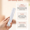 A hand holds a white sonic dermaplaning tool for facial hair and peach fuzz removal.