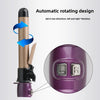 Automatic rotating curling iron in a bronze and purple color, showing the rotating mechanism.