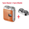 Portable silver beard shaver with an orange body and a separate blade included.