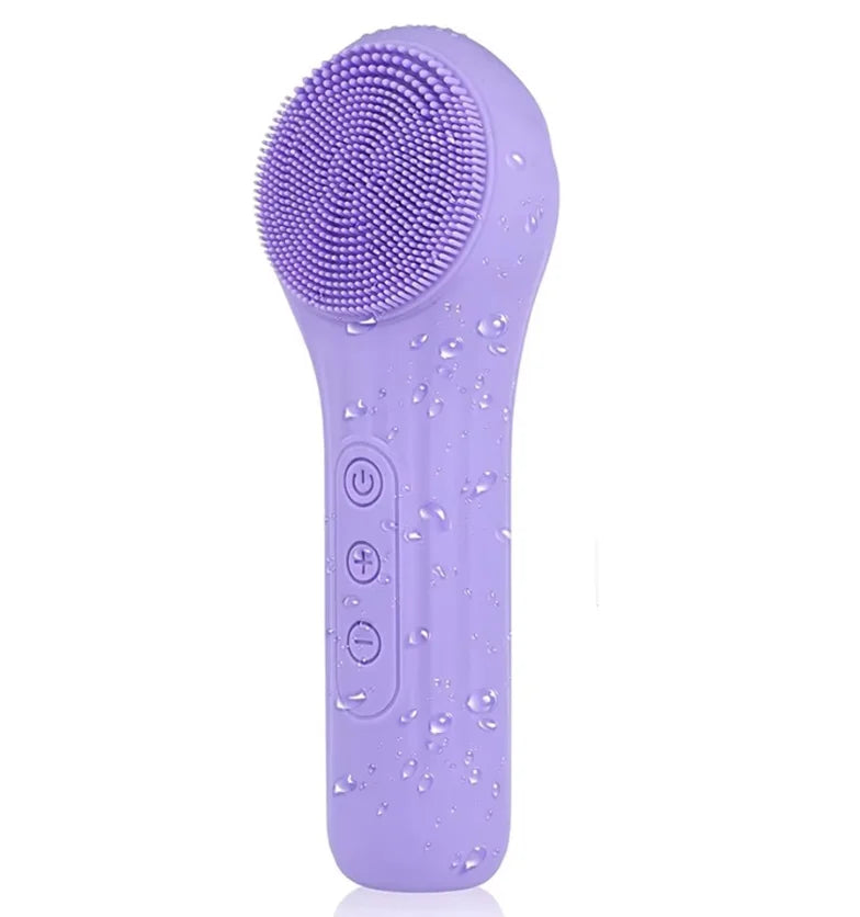 A purple electric facial cleansing and massage brush with a silicone head and power button.