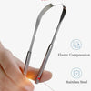 A hand holds a stainless steel tongue scraper, demonstrating its elasticity and elastic compression feature.