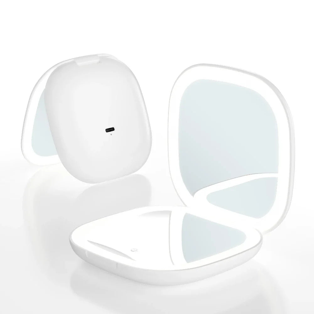 A white compact LED makeup mirror with a hinged, reflective surface is shown open.