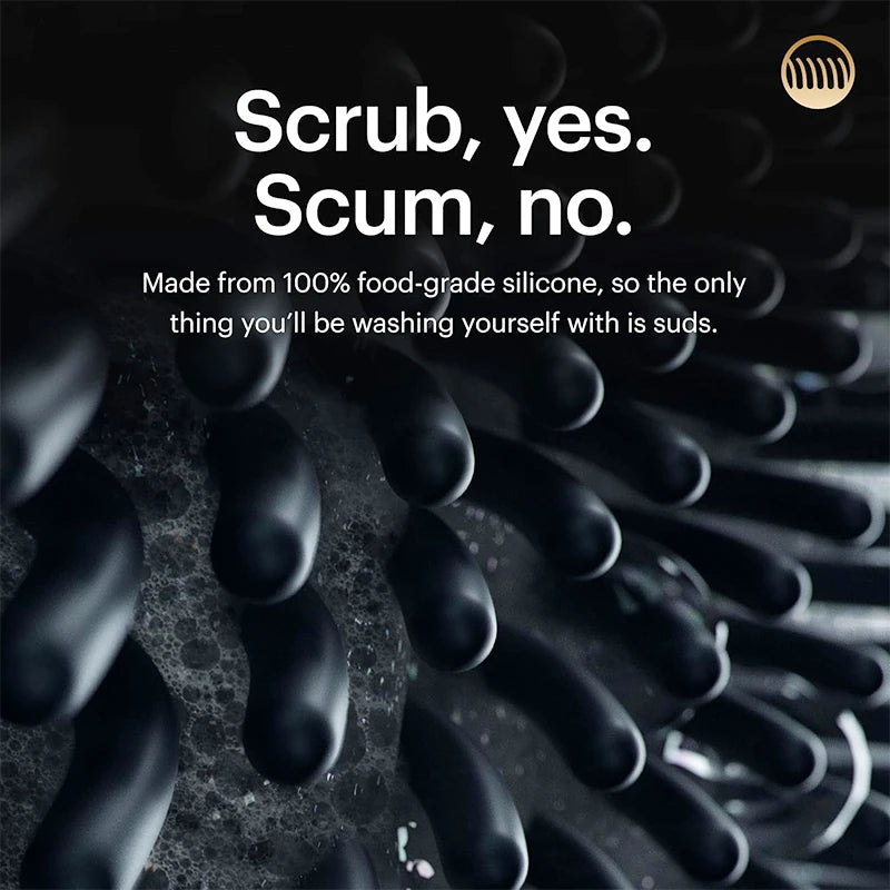 Black silicone body scrub brush with text saying Scrub yes Scum no