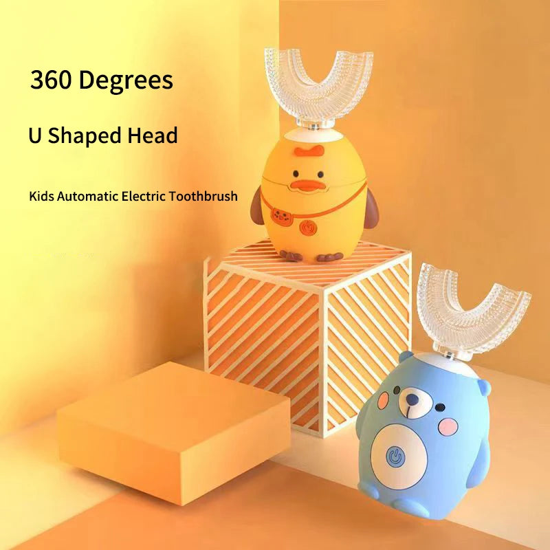 An orange duck-shaped electric toothbrush with a U-shaped head is displayed on a wooden block.