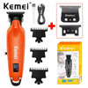 Orange Kemei cordless hair trimmer with multiple attachments and accessories