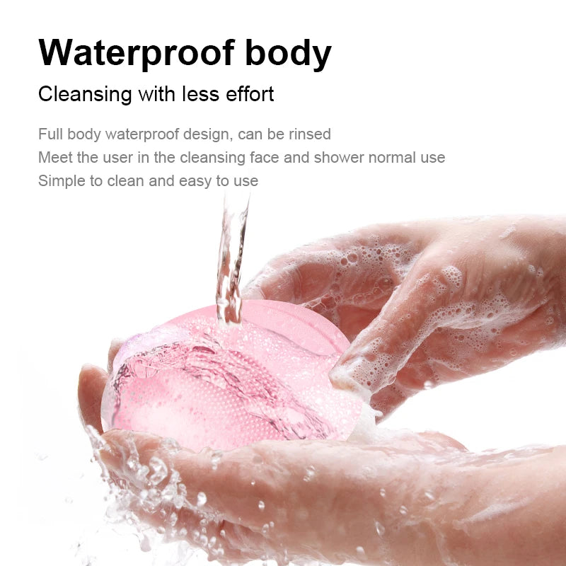 Hands are using a pink facial cleansing brush to cleanse the skin with water.