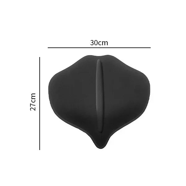 Black lumbar molder compression support board with a contoured shape and a central ridge.