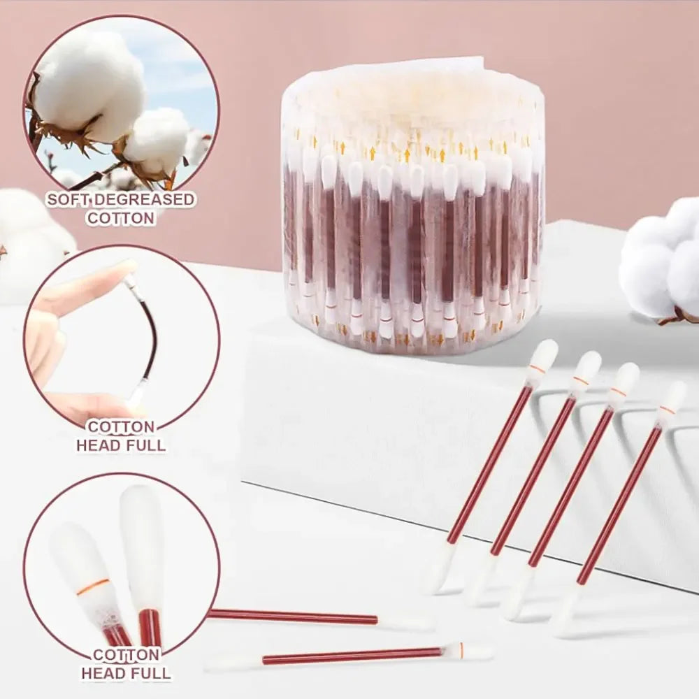 A set of disposable medical iodine cotton swabs in various sizes and colors displayed on a white surface.