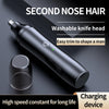 A black fully automatic rechargeable electric nose and ear trimmer with a washable knife head shown on a dark surface.