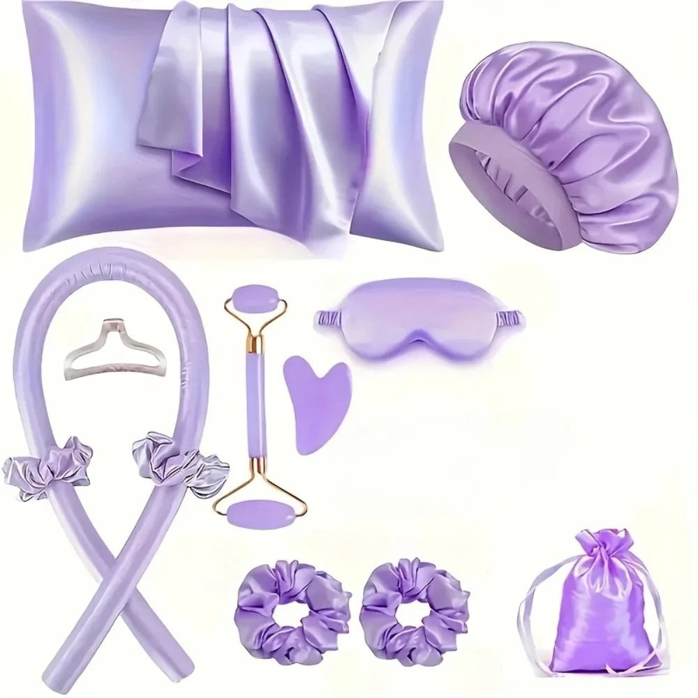 A purple heatless curling kit featuring silk accessories including a pillow, a silicone tool, and hair accessories.