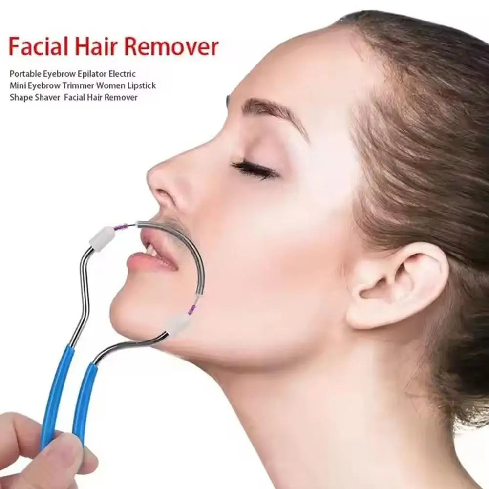 A woman is using a handheld facial hair remover device on her upper lip.