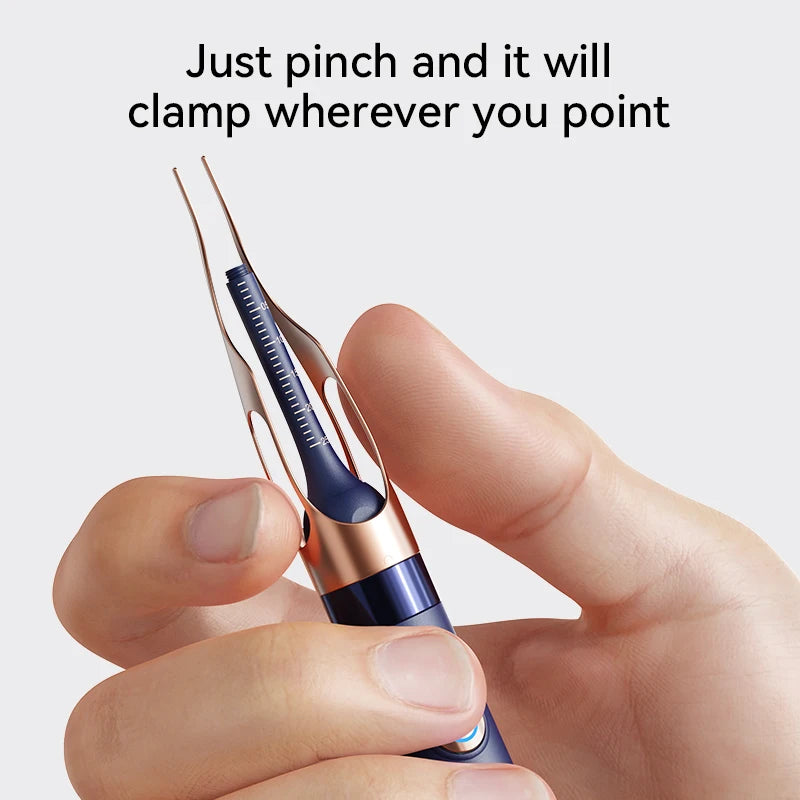 A hand is pinching a thin, metallic tool with a blue and gold handle, demonstrating its clamping function.