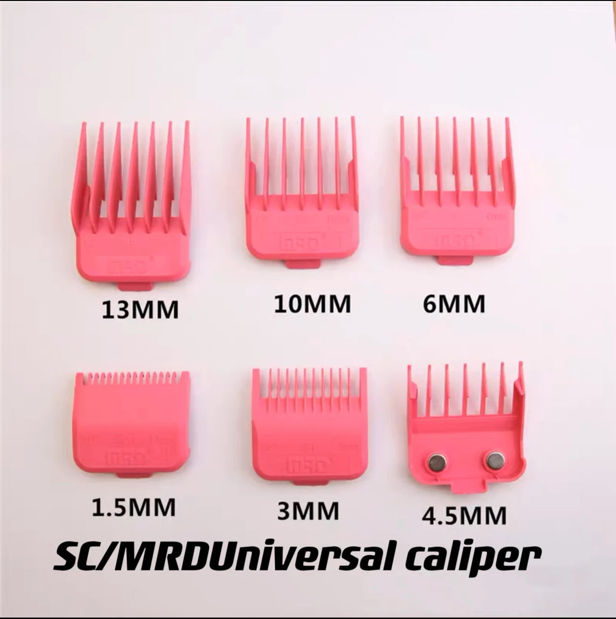 A set of pink calipers with various sizes including 13MM, 10MM, 6MM, 1.5MM, 3MM, and 4.5MM.