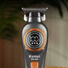 Kemei KM-999 electric hair clipper with ABS body, showing various components like the blade and charging interface.