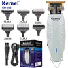 A set of Kemei professional cordless hair clippers and trimmers in black and white packaging.