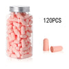 A clear jar filled with 120 pink memory foam earplugs.