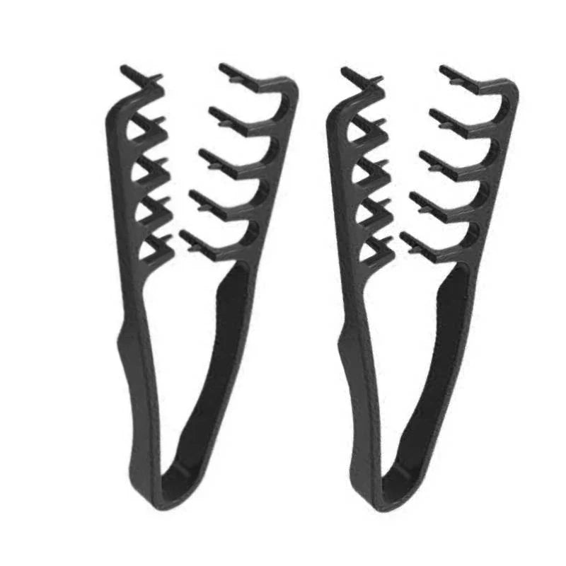 A pair of black volumizing wide-tooth hair styling combs.
